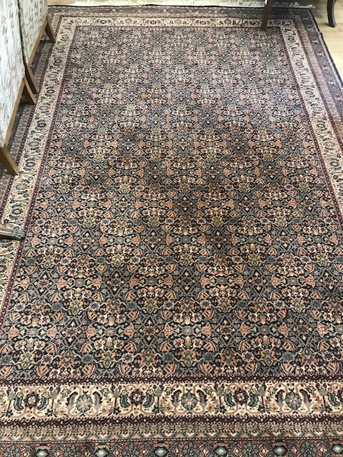 A Persian style rug 295 x 199cm